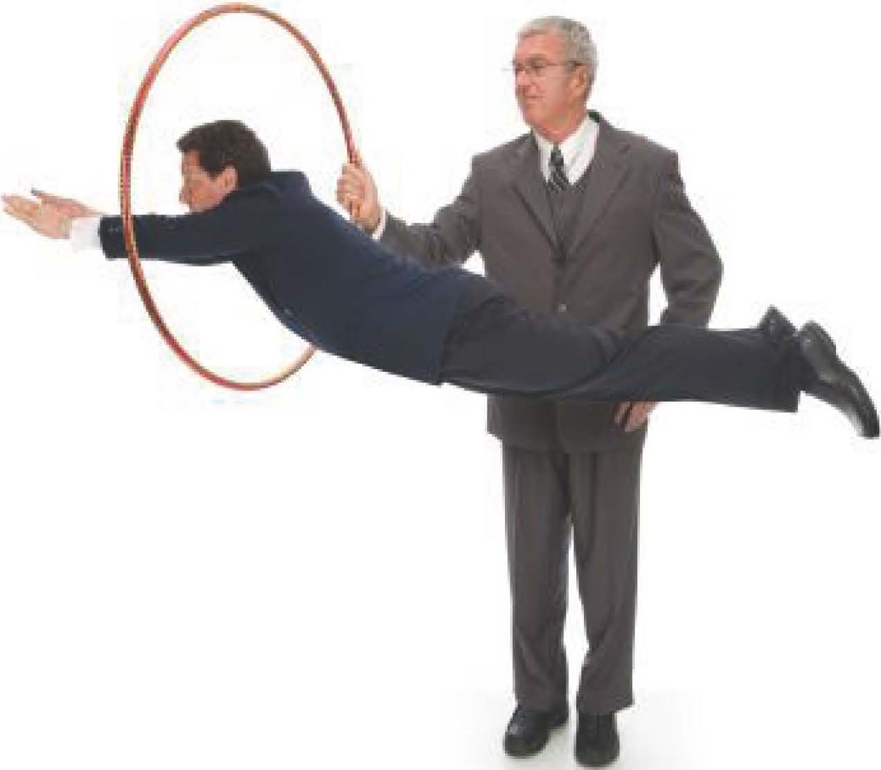 CEO holding up a hoop for his employee to jump through